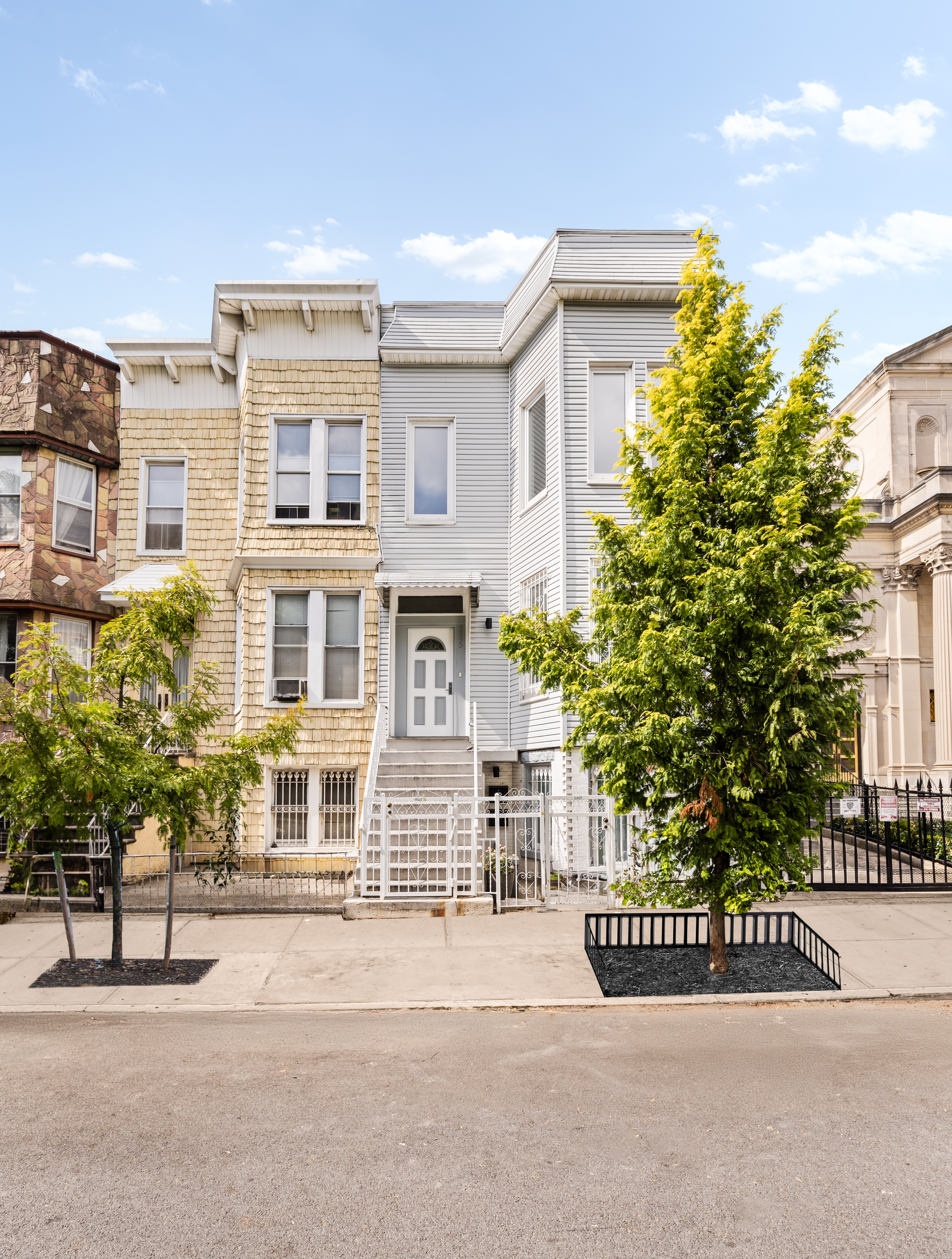 285 Weirfield Street Brooklyn, NY 11221 - Photo 14 of 16 a view of a brick house with many windows