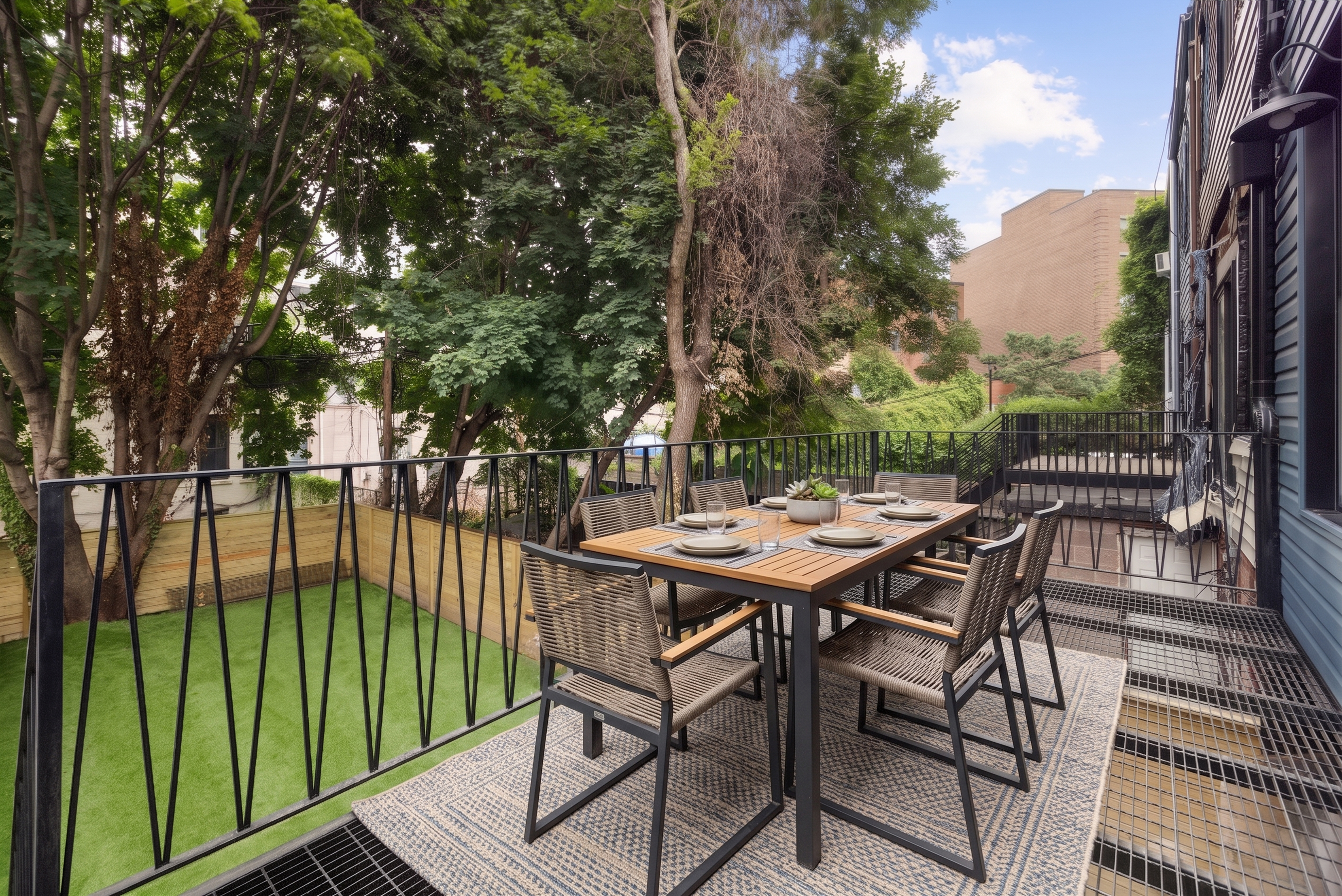 737 Decatur Street Brooklyn, NY 11233 - Photo 5 of 19 a view of a backyard with a deck and hardwood