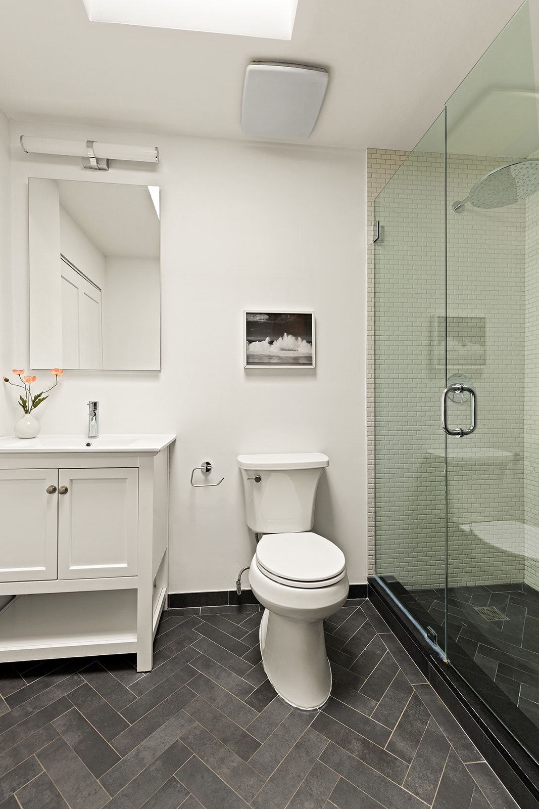 375 Lincoln Place, Unit 4F Brooklyn, NY 11238 - Photo 6 of 10 a bathroom with a toilet sink and shower