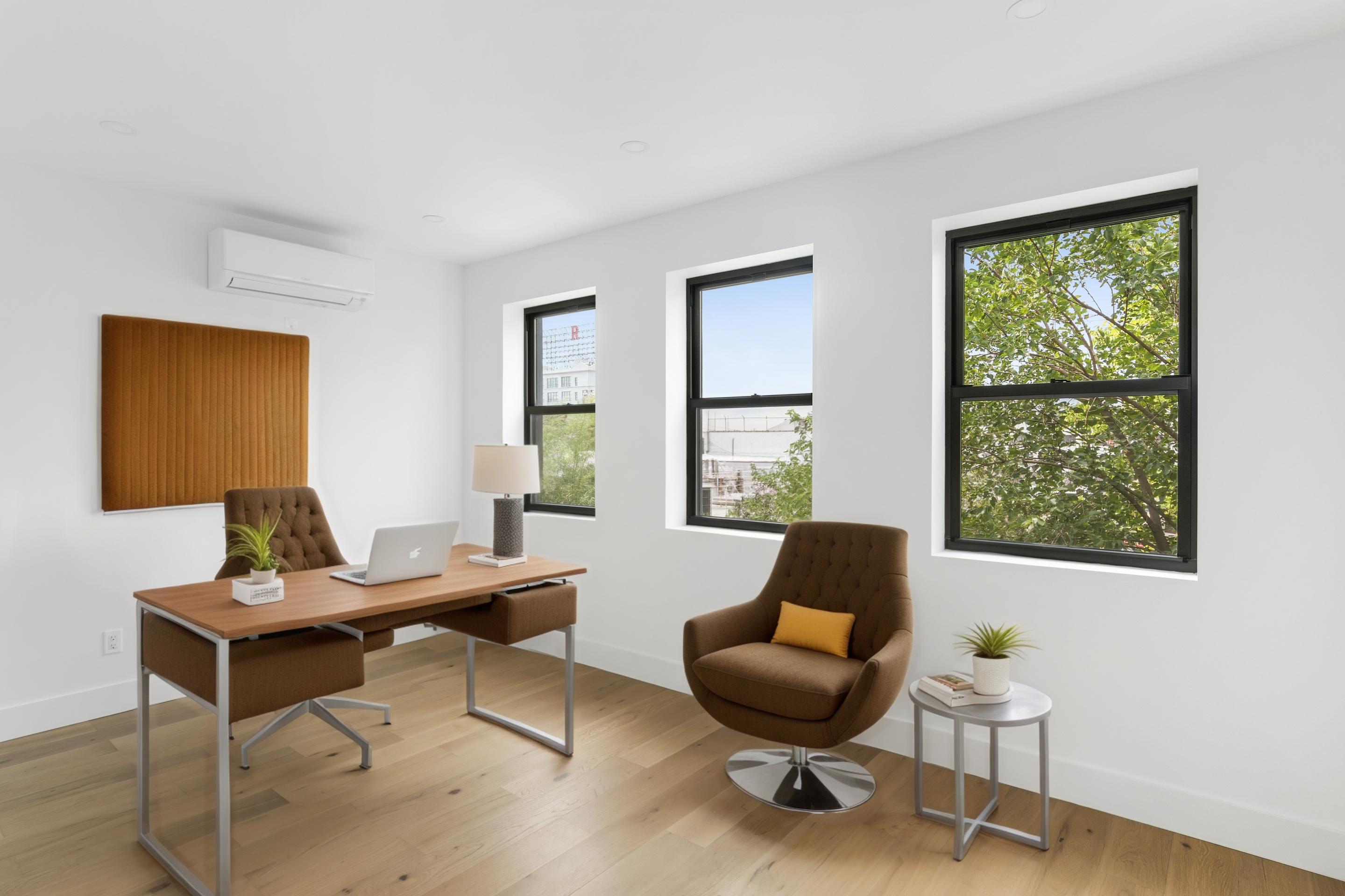 366 Columbia Street, Unit 3 Brooklyn, NY 11231 - Photo 6 of 11 a living room with furniture and a window