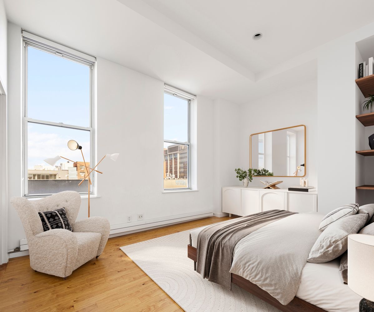 175 East Broadway, Unit 6D Manhattan, NY 10002 - Photo 12 of 18 a bedroom with bed and window