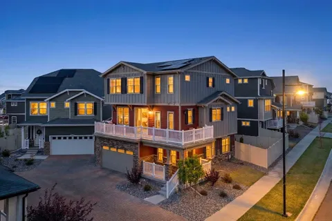 a aerial view of a house with a yard