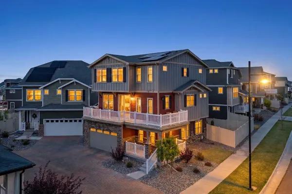 a aerial view of a house with a yard