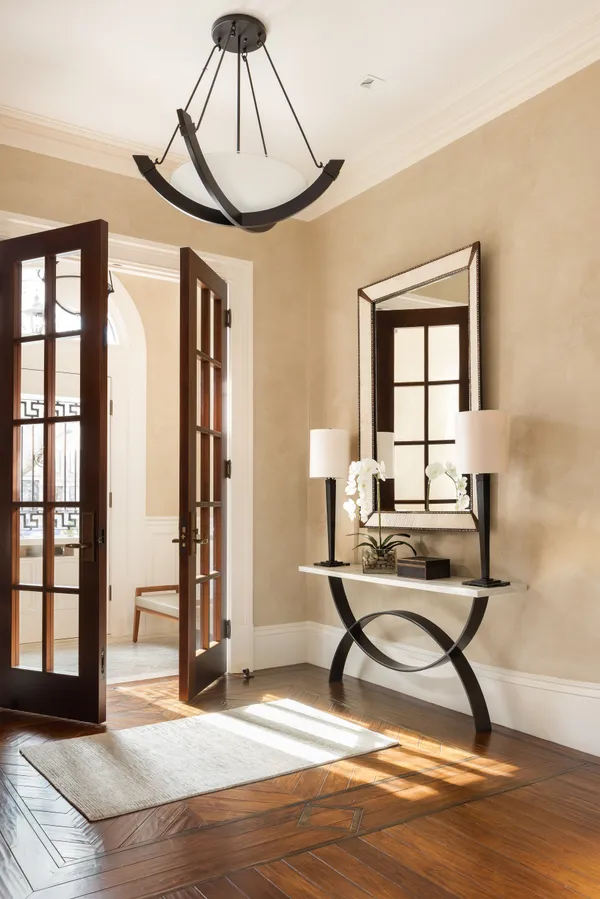 a view of a livingroom with furniture and windows