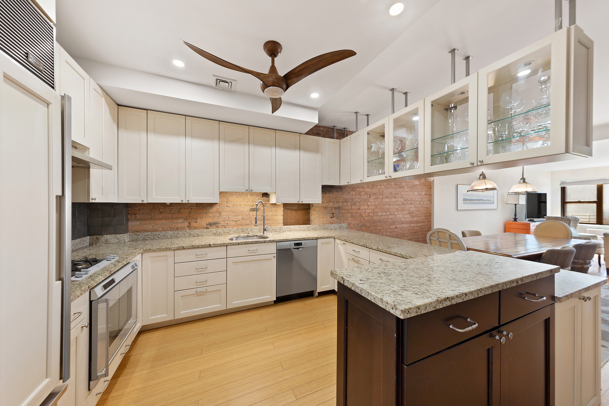 216 East 75th Street, Unit 3EAST Manhattan, NY 10021 - Photo 3 of 9 a kitchen with a stove a sink dishwasher and a refrigerator