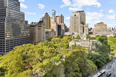 a view of a city with tall buildings