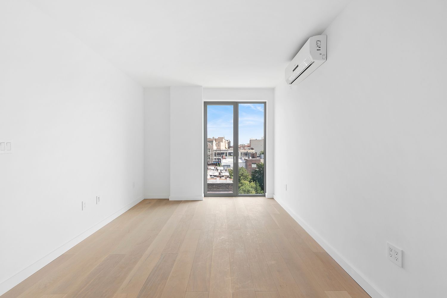 567 Ocean Avenue, Unit B504 Brooklyn, NY 11226 - Photo 5 of 8 a view of an empty room with a window