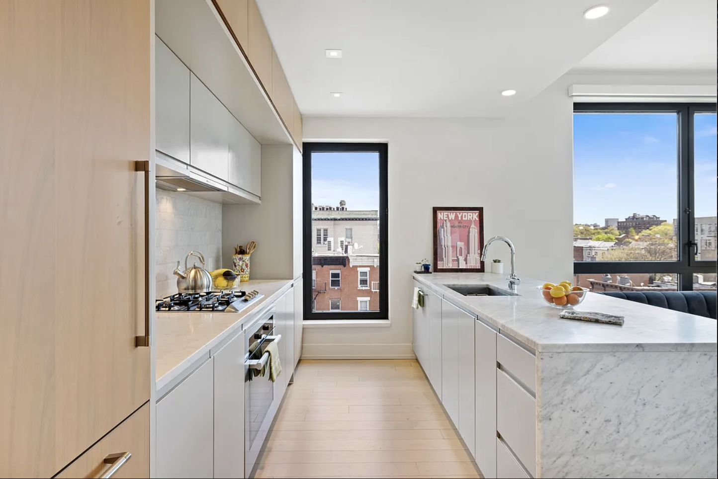 550 Vanderbilt Avenue, Unit 525 Brooklyn, NY 11238 - Photo 2 of 6 a kitchen with stainless steel appliances a sink stove and cabinets