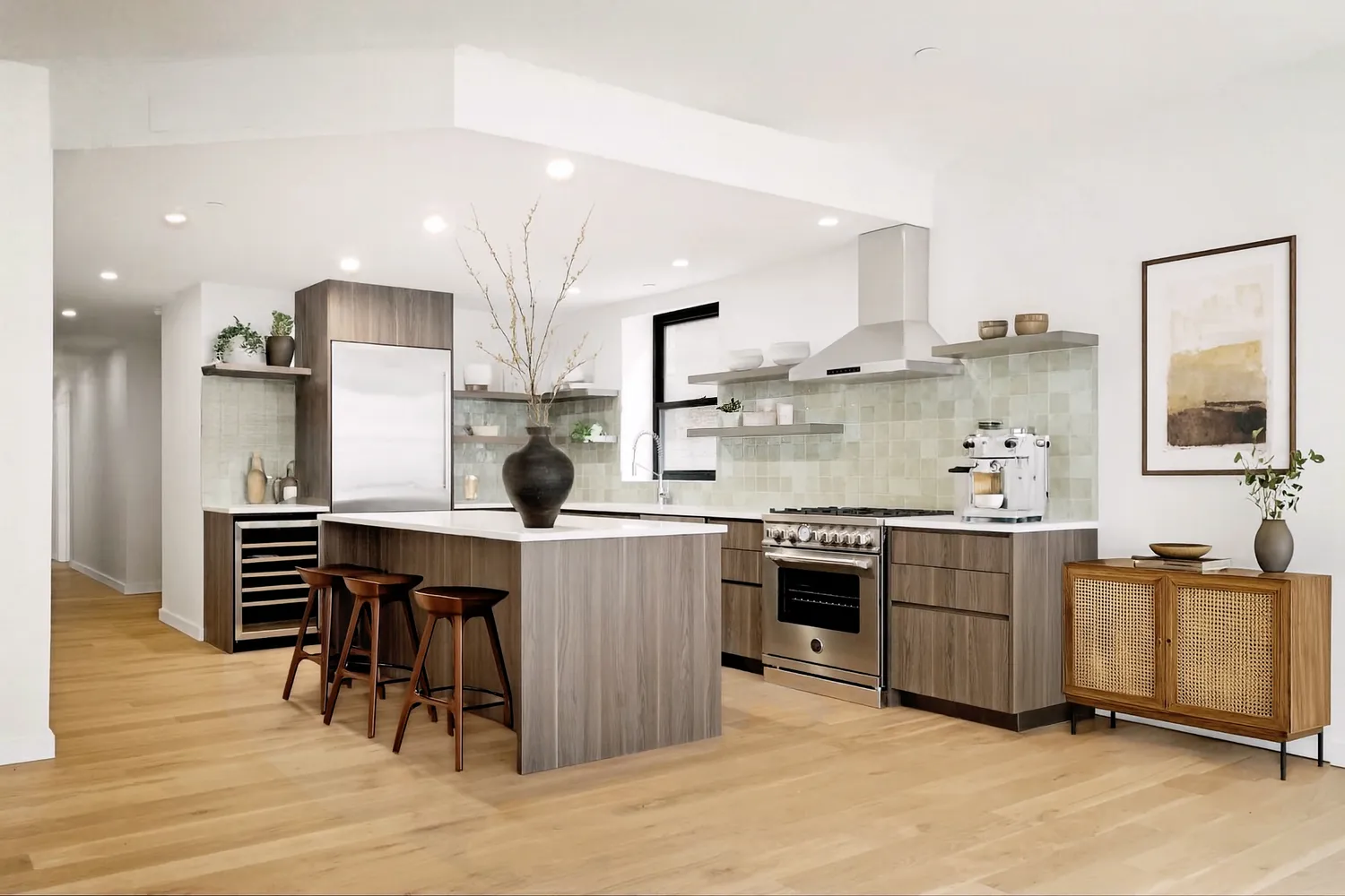 a kitchen with stainless steel appliances kitchen island granite countertop a sink and cabinets