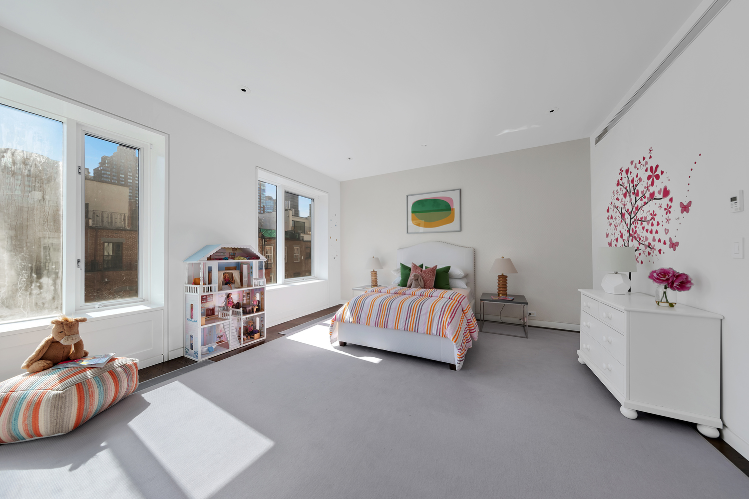 42 West 71st Street Manhattan, NY 10023 - Photo 24 of 35 a bedroom with a bed and a couch