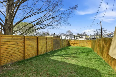 a view of a back yard of the house