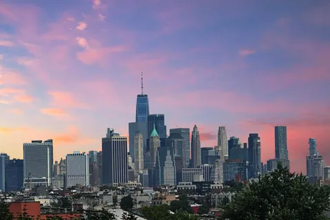 a view of a city with tall buildings