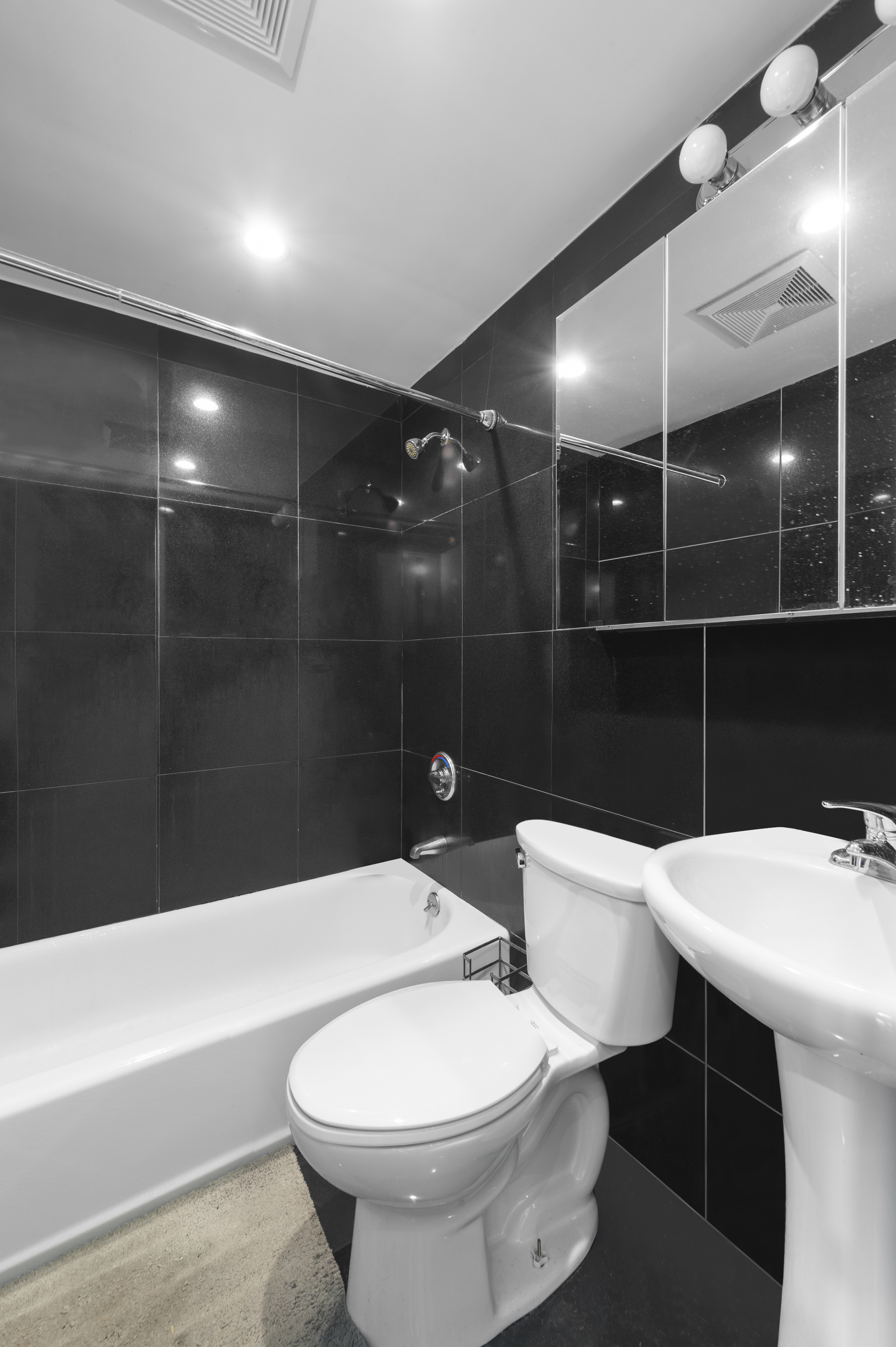 112 East 4th Street, Unit 4 Manhattan, NY 10003 - Photo 5 of 6 a bathroom with a sink toilet and shower