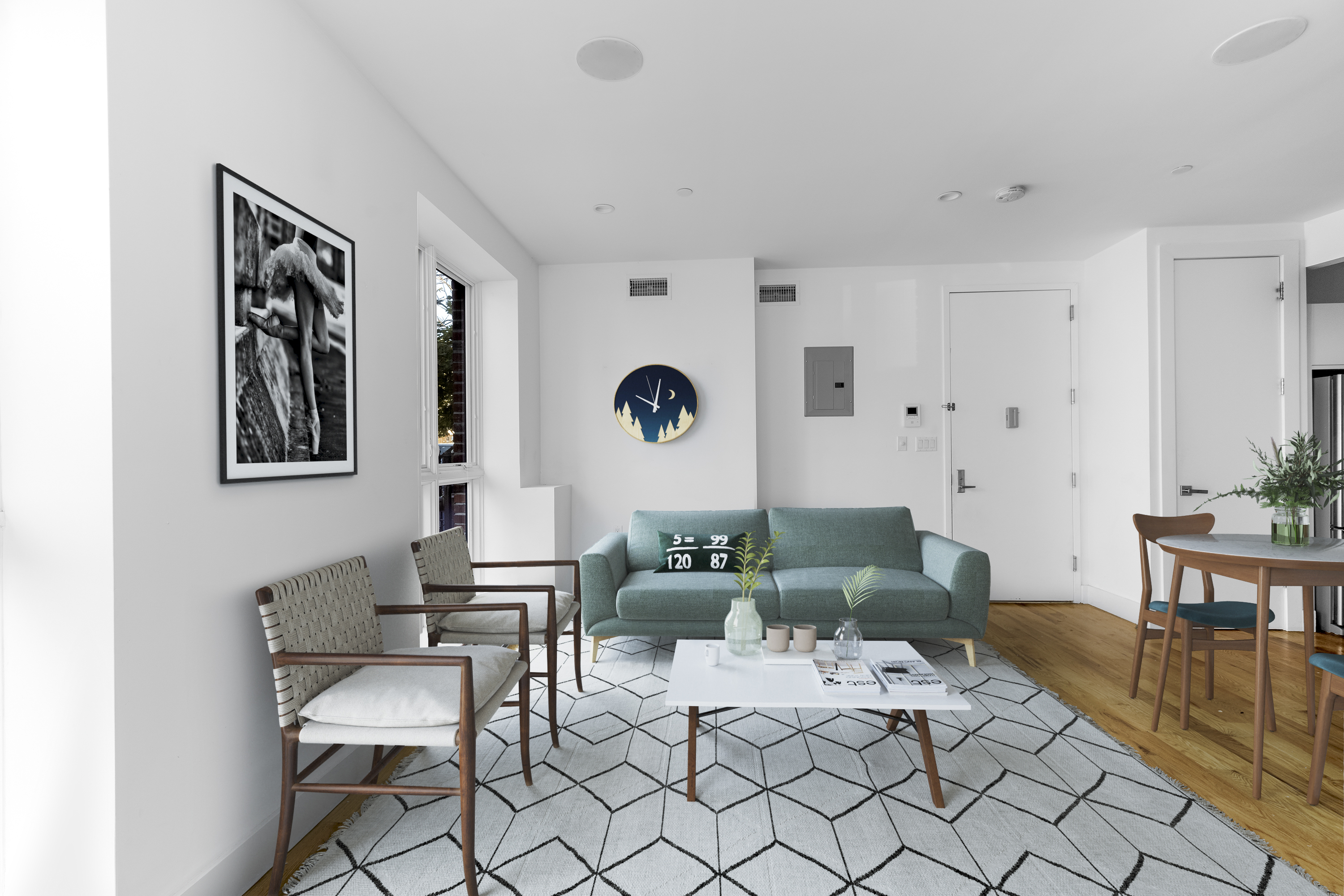 18 A Bleecker Street, Unit 1A Brooklyn, NY 11221 - Photo 2 of 6 a living room with furniture and wooden floor