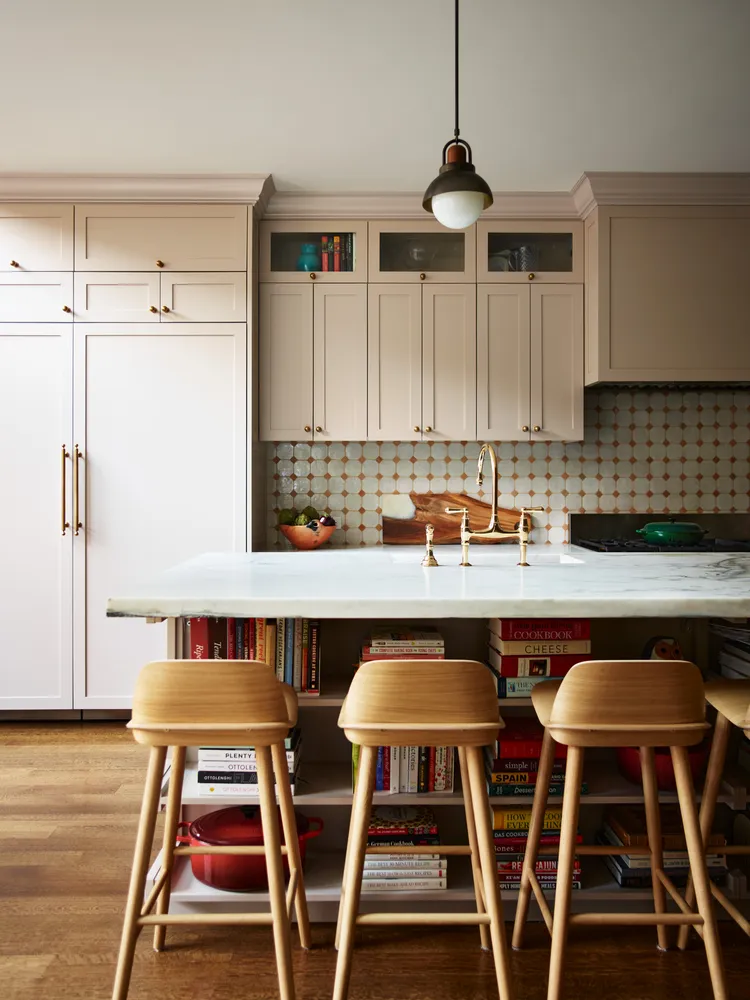 a dinning table and chairs in a kitchen