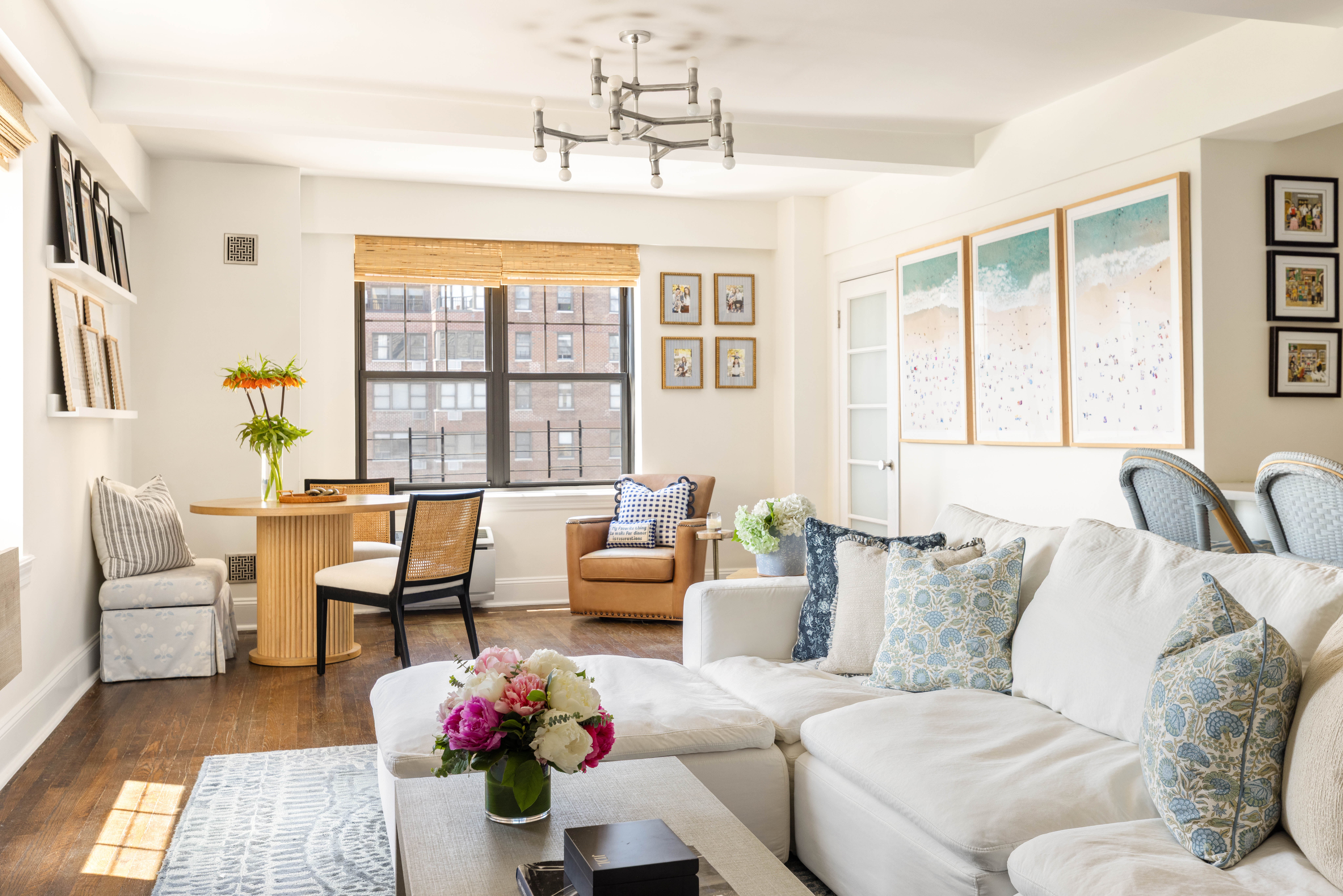 200 East 16th Street, Unit 14C Manhattan, NY 10003 - Photo 2 of 14 a living room with furniture and flowers