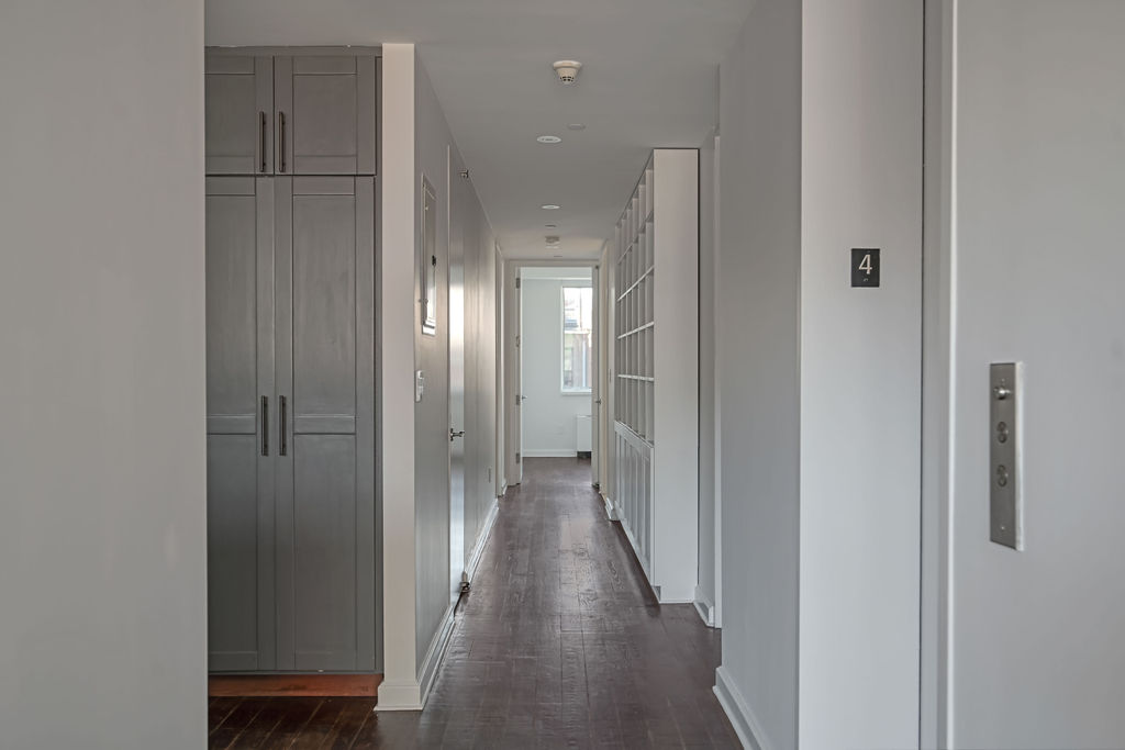 32 West 128th Street, Unit 4 Manhattan, NY 10027 - Photo 10 of 12 a view of a hallway with wooden floor