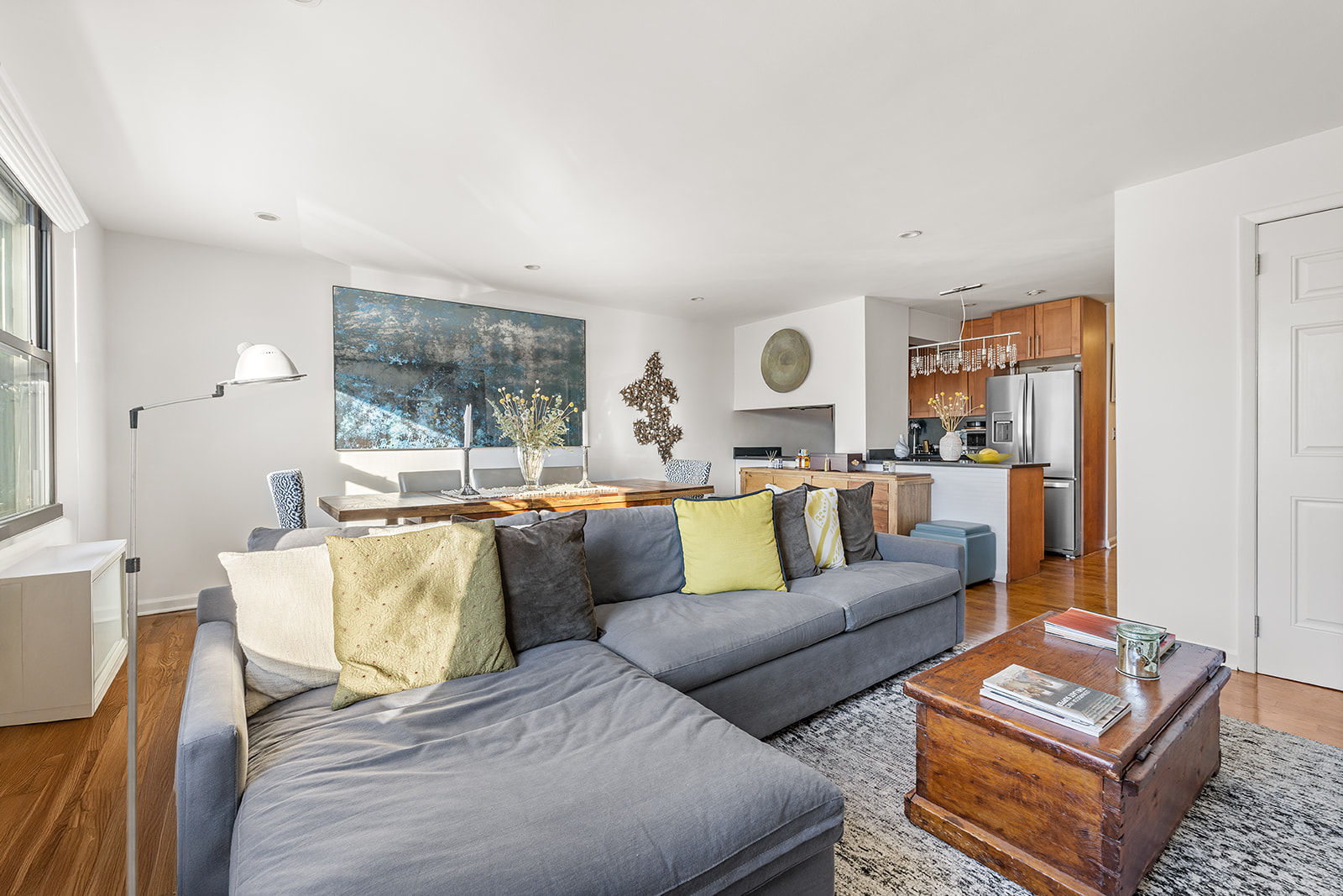 376 West Street, Unit 1A Manhattan, NY 10014 - Photo 2 of 11 a living room with furniture and a table