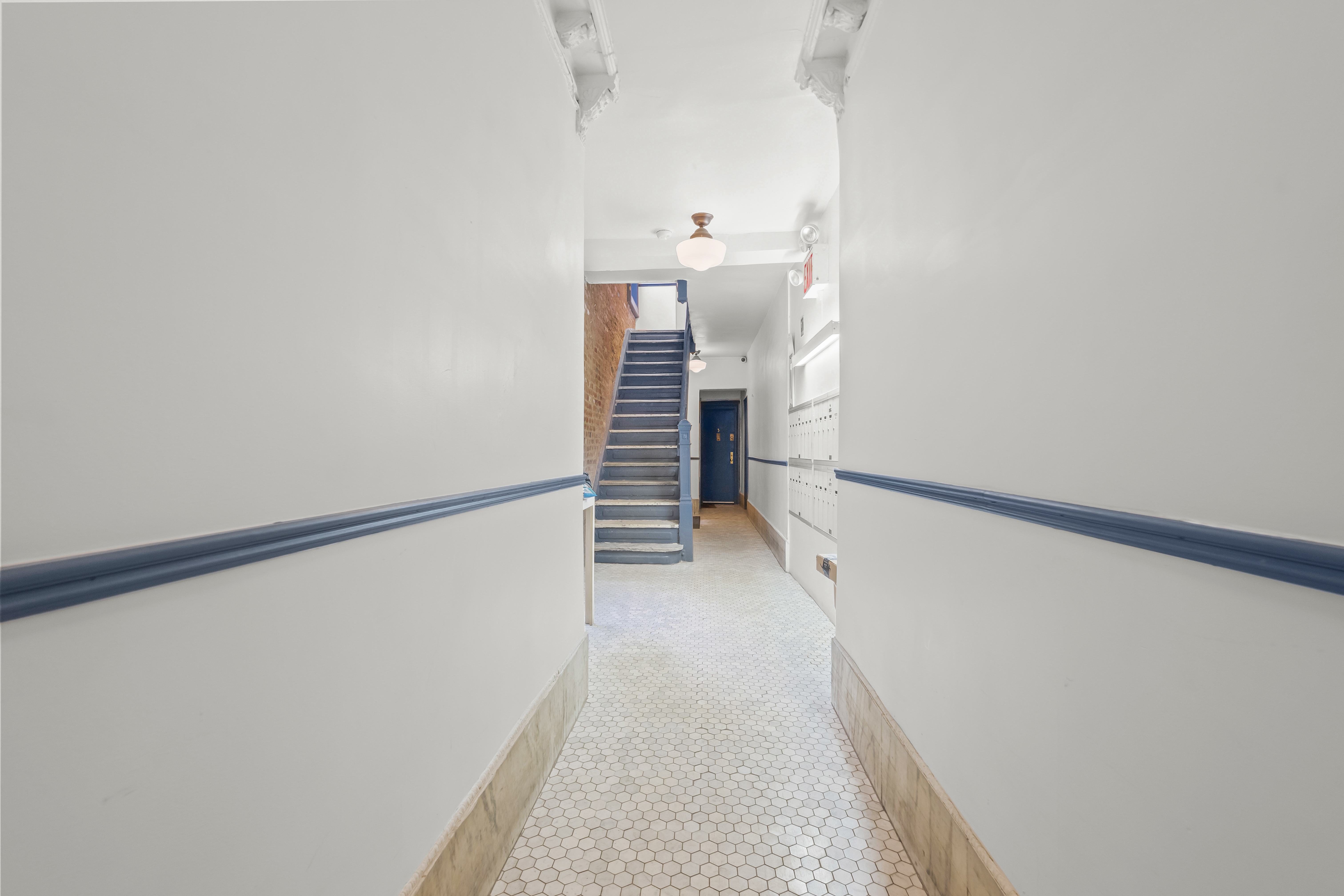 204 West 10th Street, Unit 7A Manhattan, NY 10014 - Photo 15 of 17 a view of a hallway with stairs