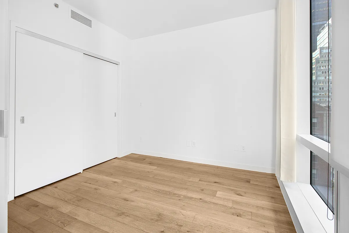 325 Lexington Avenue, Unit 15C Manhattan, NY 10016 - Photo 5 of 16 a view of small space with wooden floor