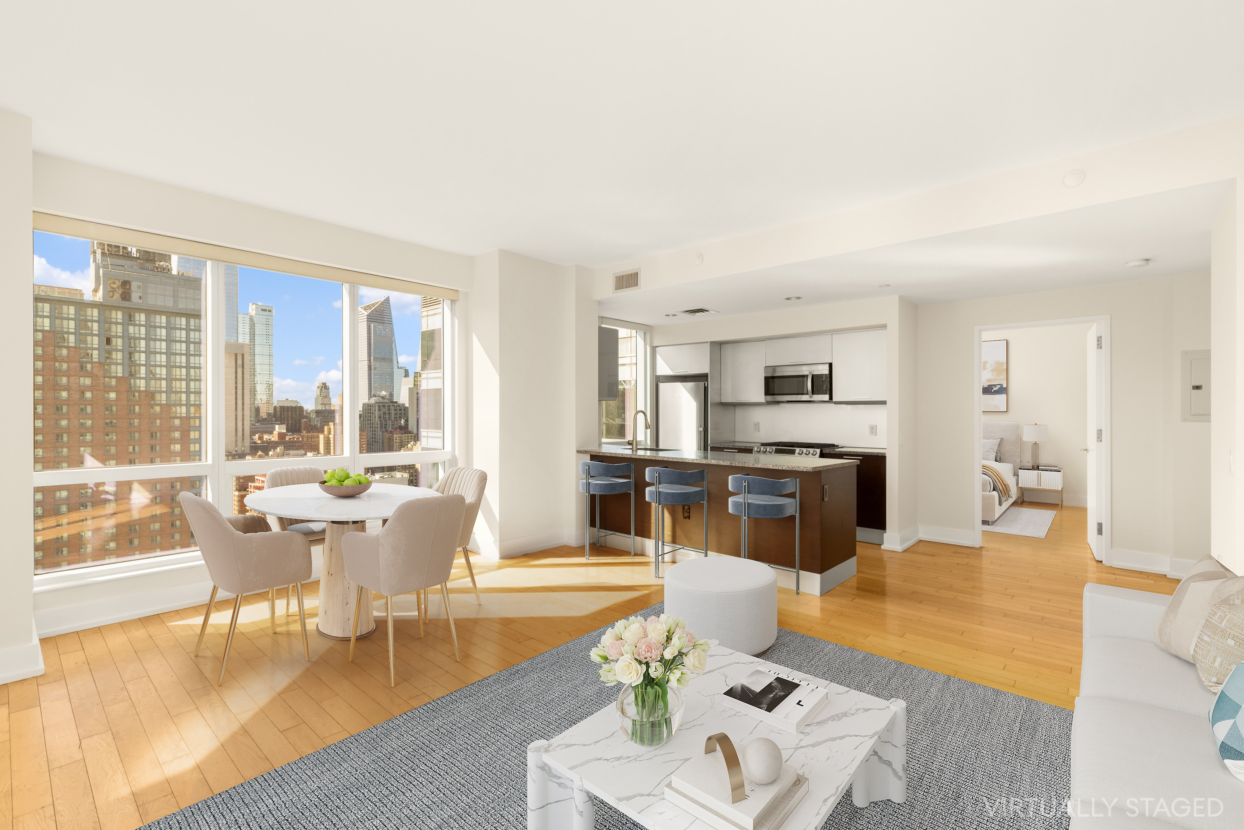 350 West 42nd Street, Unit 26G Manhattan, NY 10036 - Photo 3 of 11 a living room with furniture wooden floor and a large window