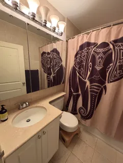 a bedroom with a bed and furniture