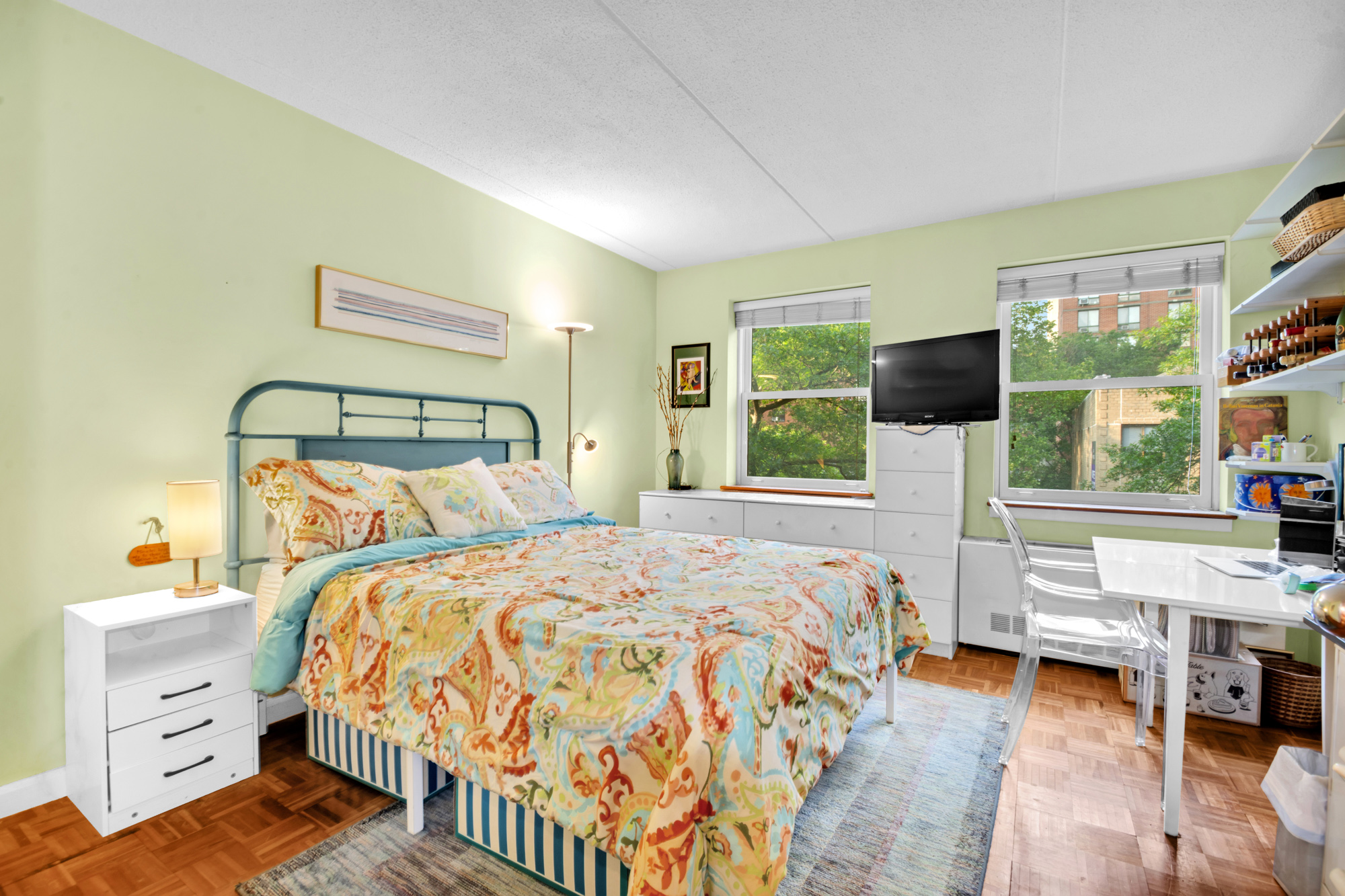 110 West 90th Street, Unit 3M Manhattan, NY 10024 - Photo 5 of 7 a bedroom with a bed and a flat tv screen on dresser