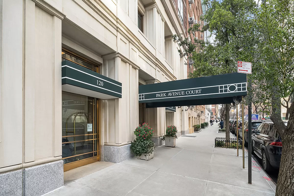 120 East 87th Street, Unit R10C Manhattan, NY 10128 - Photo 12 of 13 a view of a street with potted plants