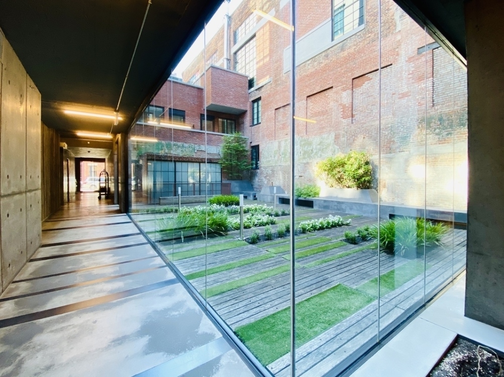 205 Water Street, Unit 7N Brooklyn, NY 11201 - Photo 8 of 11 a view of a garden from a windows