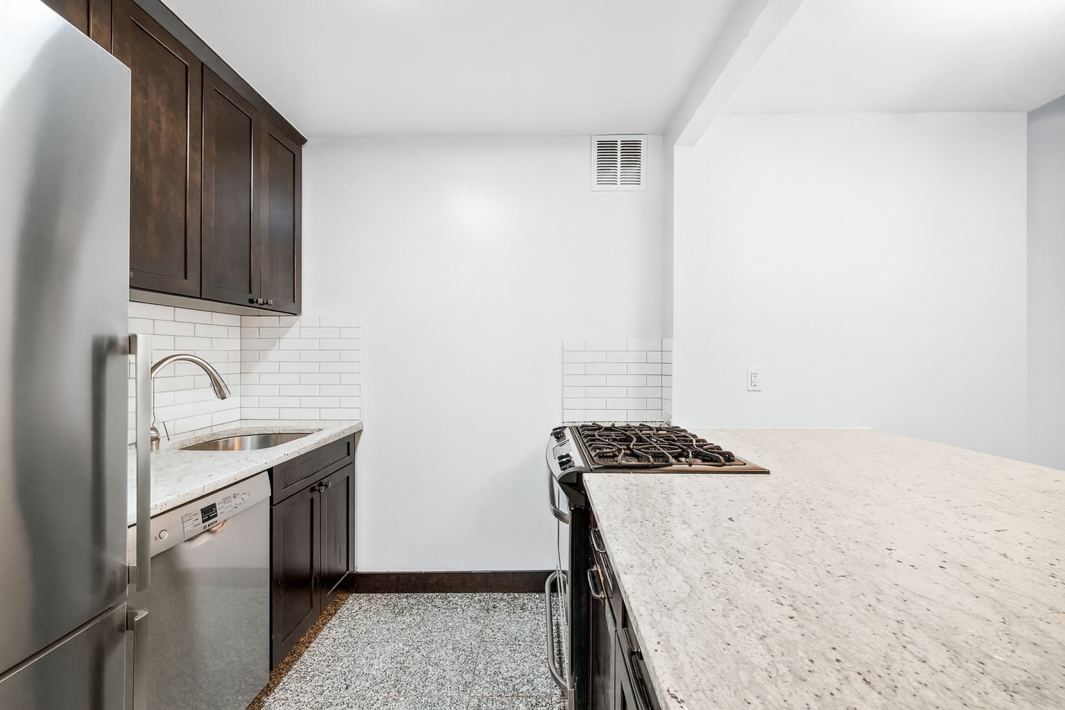 301 West 57th Street, Unit 3E Manhattan, NY 10019 - Photo 4 of 13 a walk in closet with wooden floor