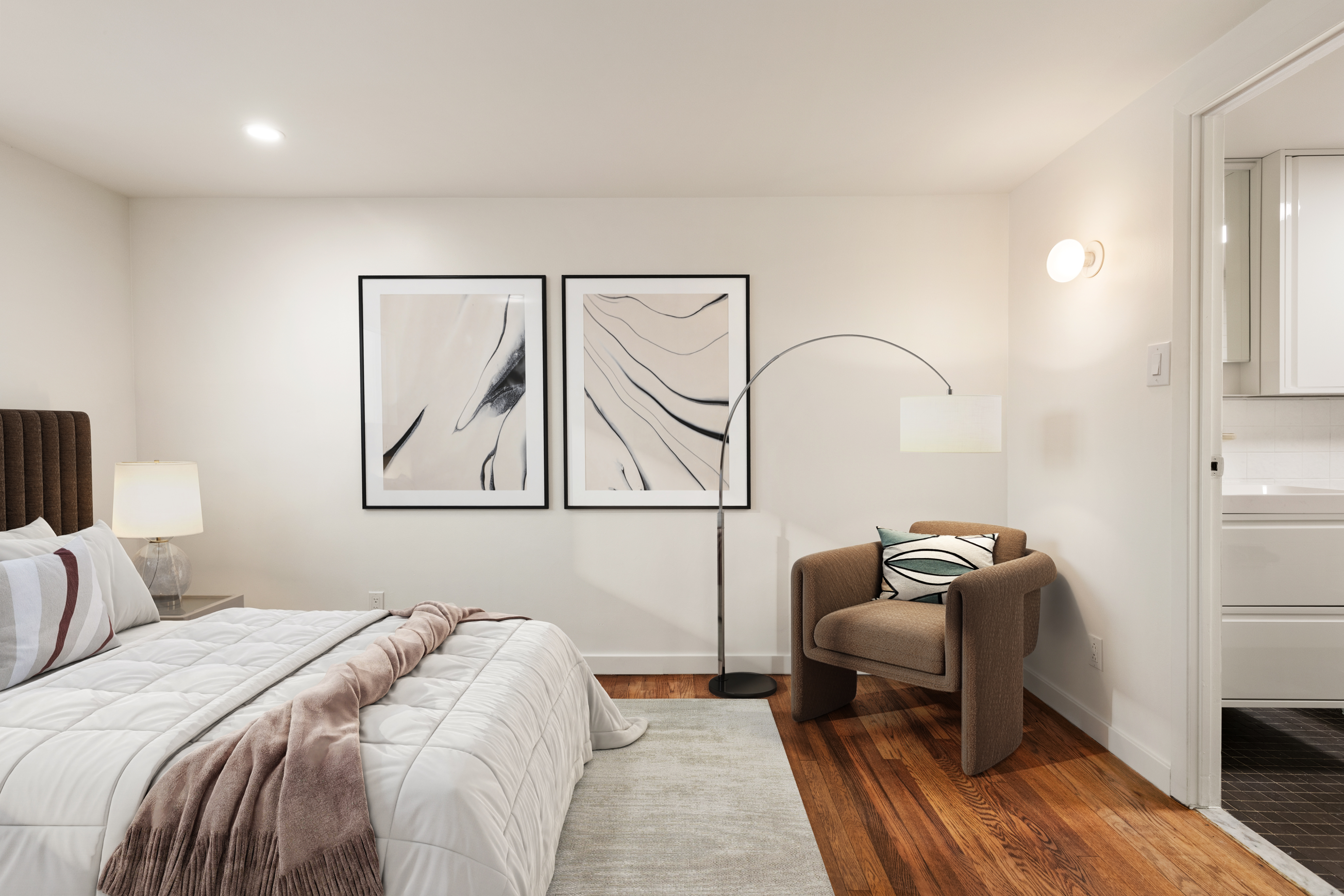 341 Adelphi Street, Unit 1 Brooklyn, NY 11238 - Photo 5 of 7 a bedroom with a bed and a couch
