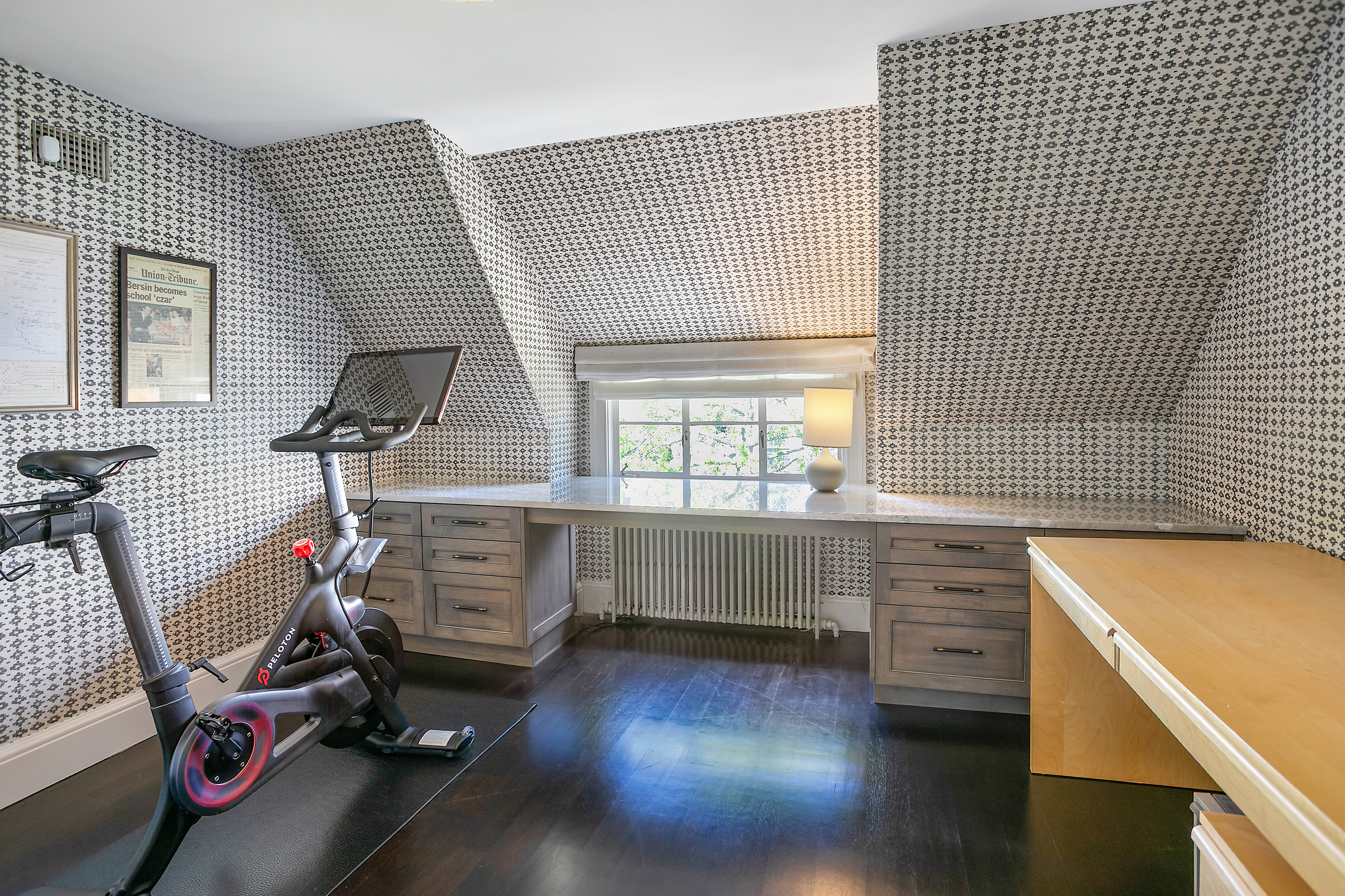 1832 Corcoran Street Northwest Washington, DC 20009 - Photo 13 of 29 a room with gym equipment and a large window