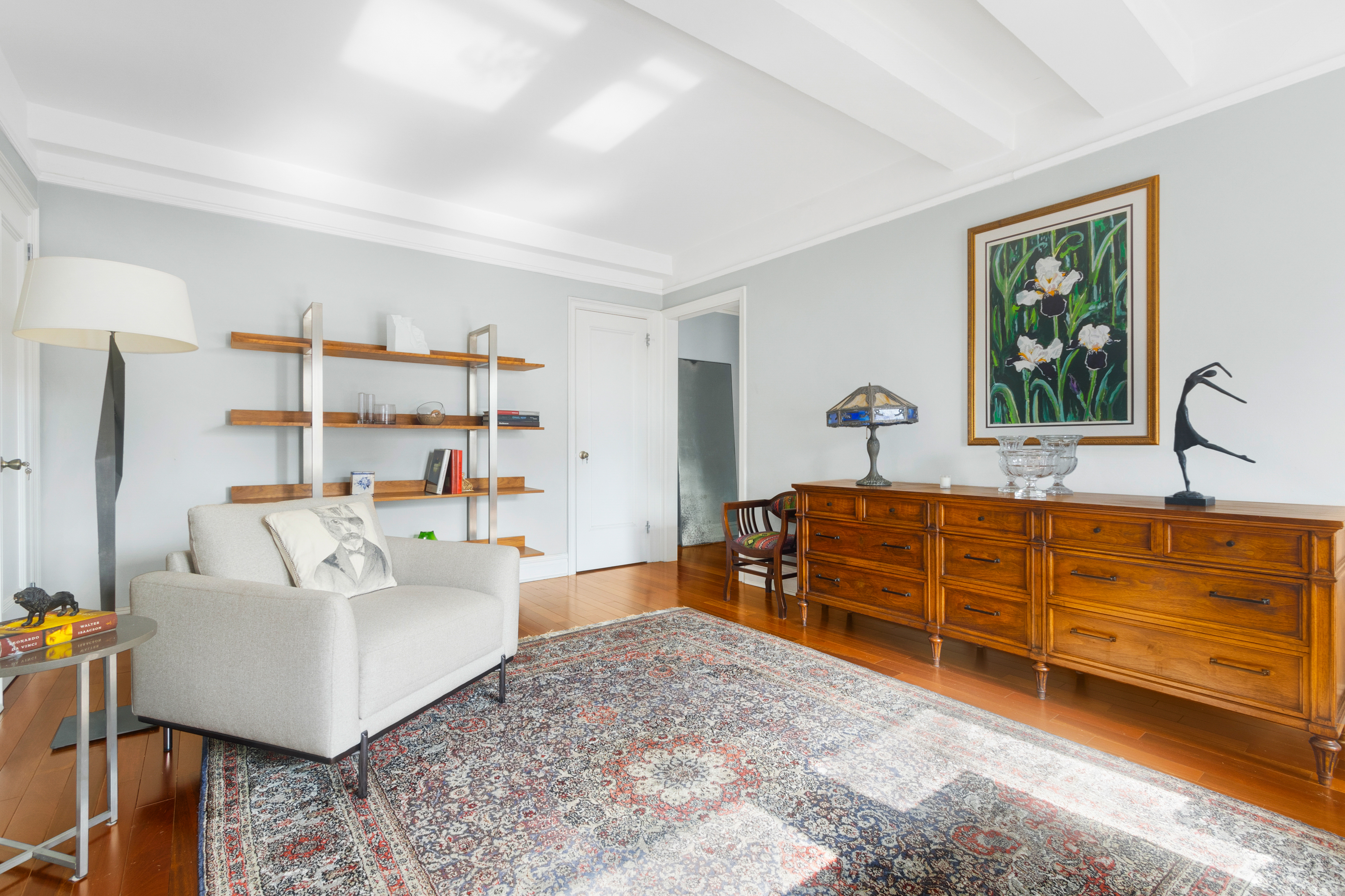 175 West 93rd Street, Unit 17I Manhattan, NY 10025 - Photo 2 of 18 a living room with furniture a baby crib and a couch