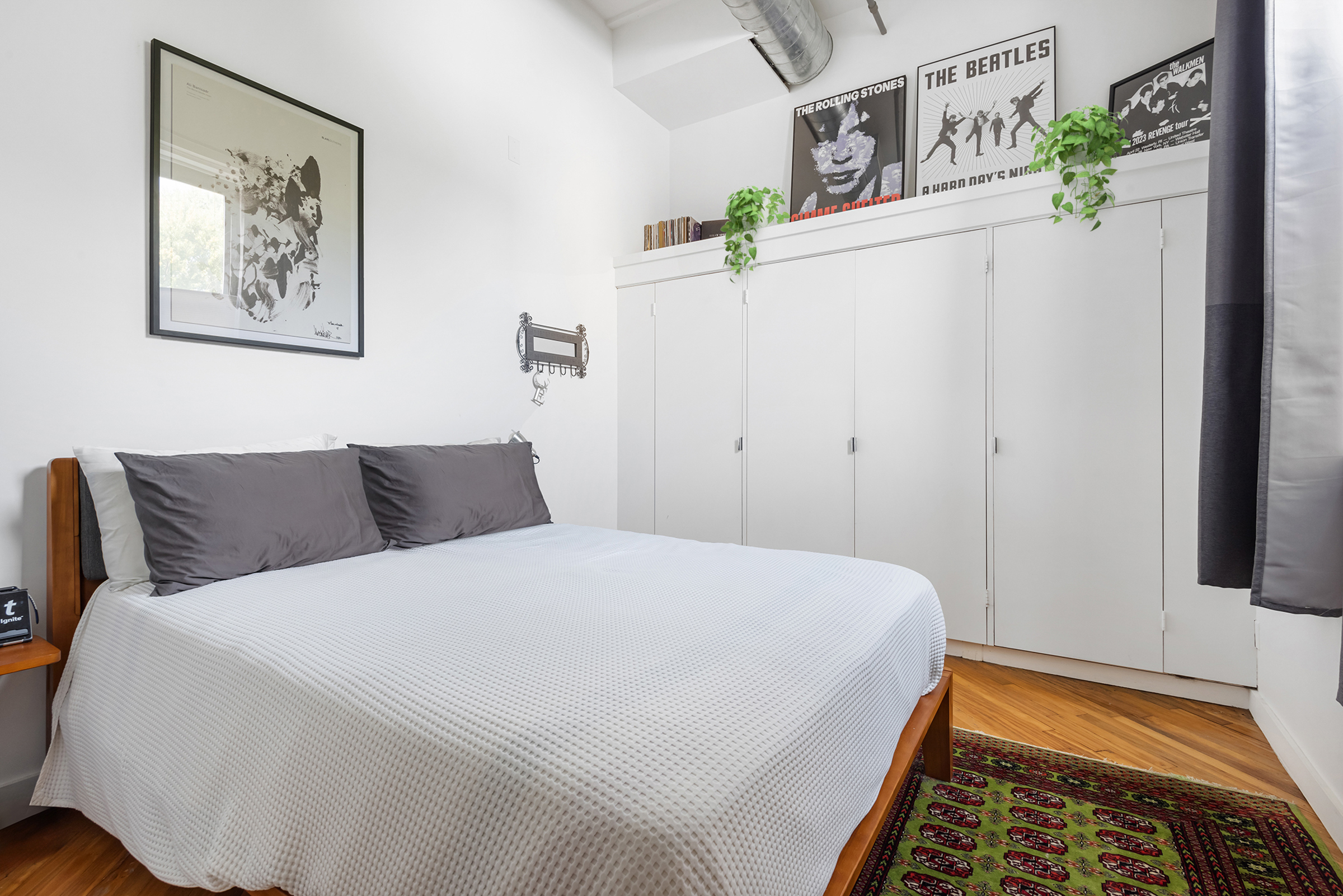 105 Lexington Avenue, Unit 2G Brooklyn, NY 11238 - Photo 10 of 17 a bedroom with a bed and a rug