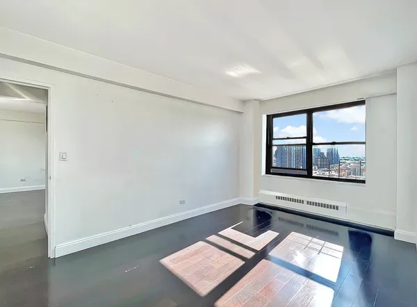 an empty room with windows