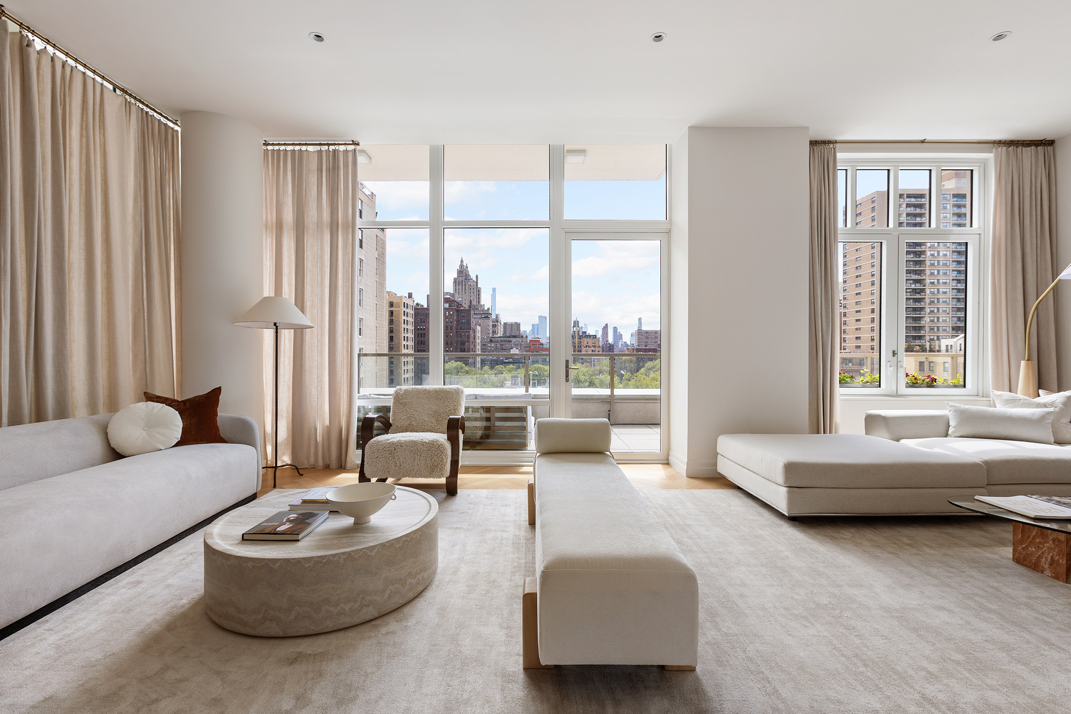 15 West 96th Street, Unit 11 Manhattan, NY 10025 - Photo 3 of 19 a living room with furniture and a large window
