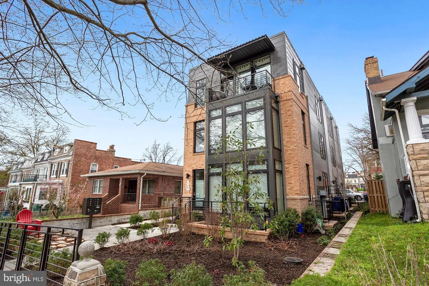 a front view of a building with garden