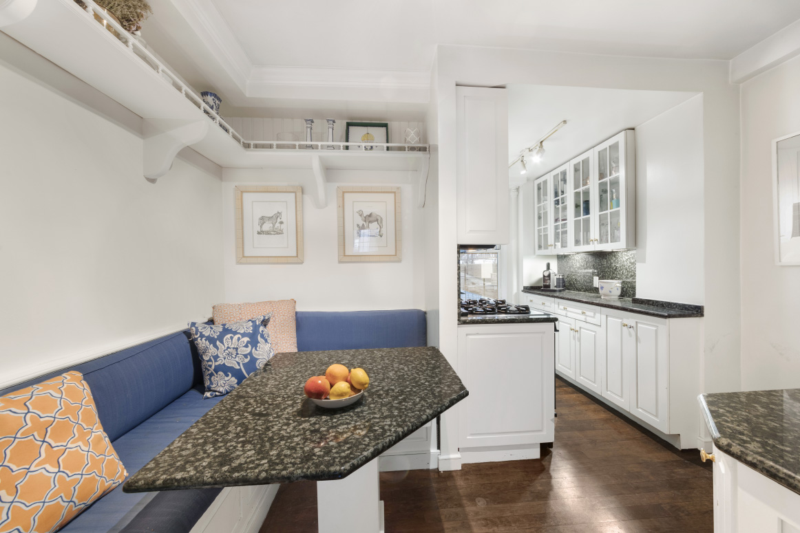 130 East 94th Street, Unit 1A Manhattan, NY 10128 - Photo 5 of 11 a living room with furniture and wooden floor