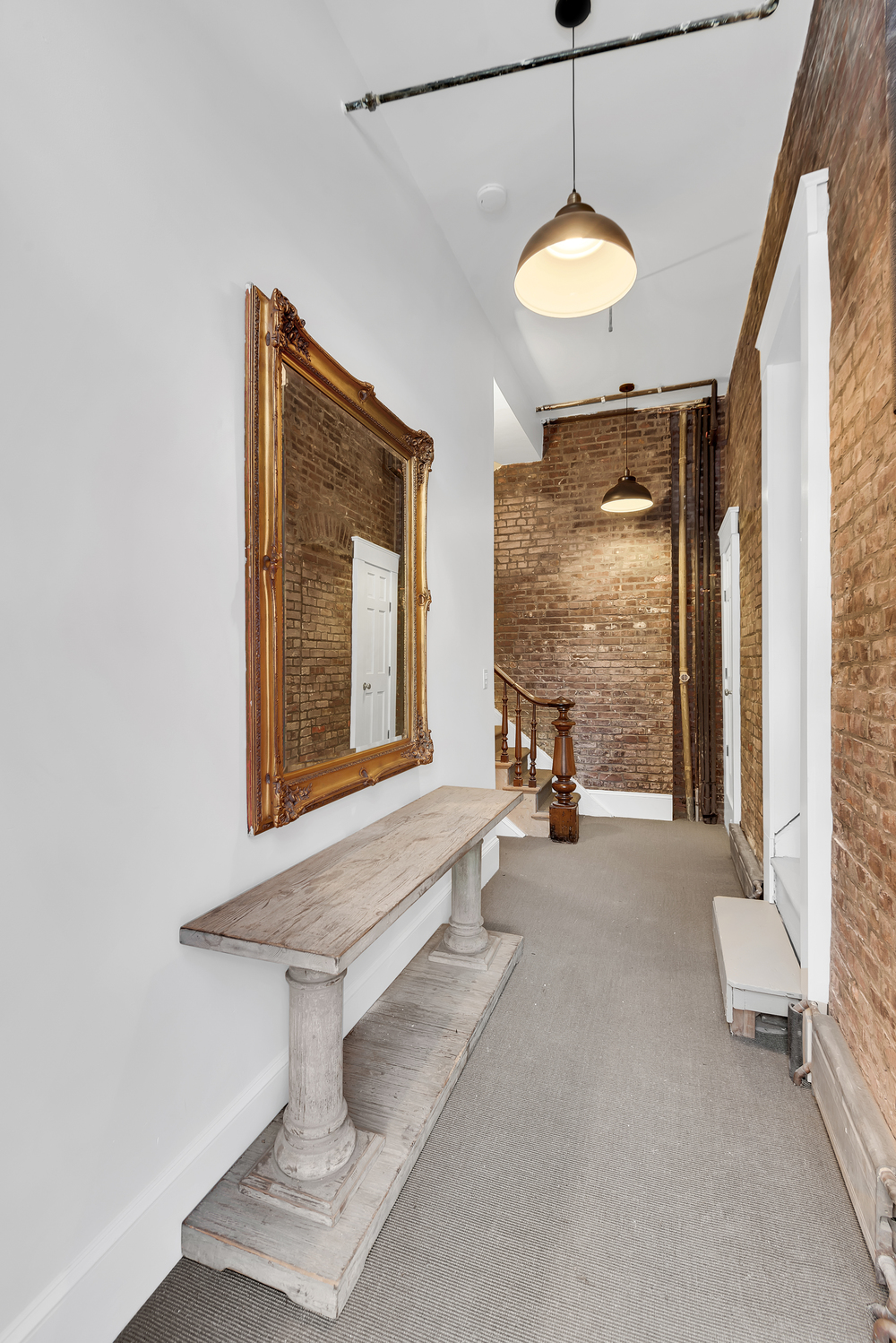 39 Clifton Place Brooklyn, NY 11238 - Photo 3 of 32 a very nice looking room with a large window and chandelier