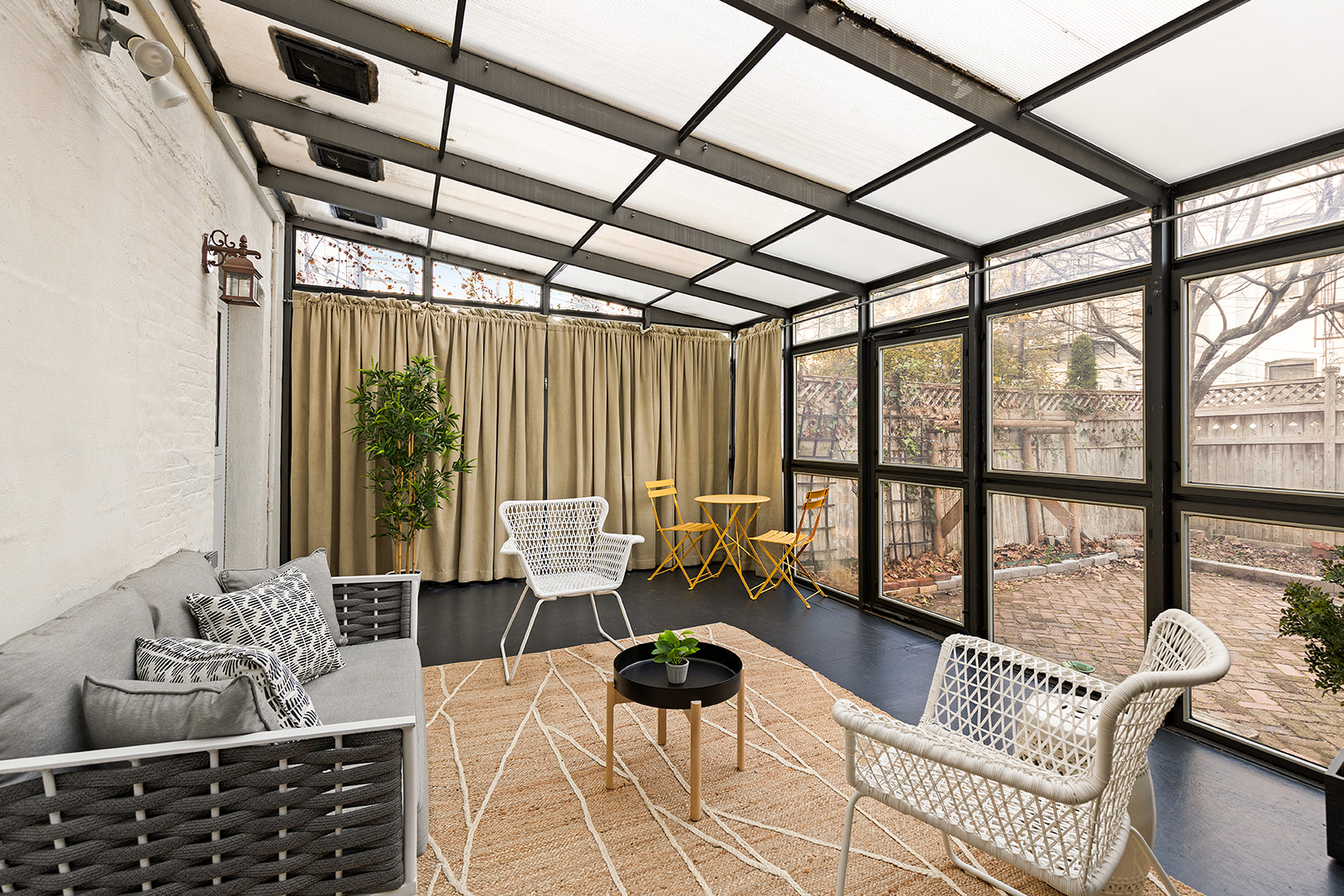 521 84th Street Brooklyn, NY 11209 - Photo 15 of 19 a living room with furniture and a large window