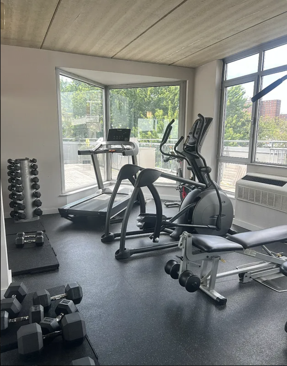192 Spencer Street, Unit 4C Brooklyn, NY 11205 - Photo 6 of 7 a view of a room with gym equipment