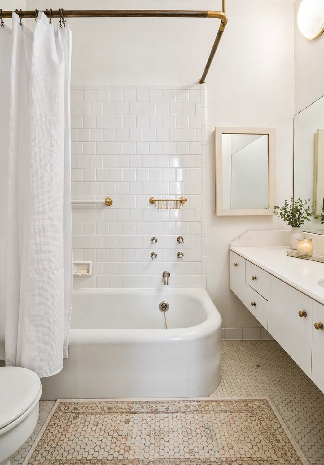 1060 Park Avenue, Unit 3A Manhattan, NY 10128 - Photo 6 of 11 a bathroom with a bathtub and a toilet