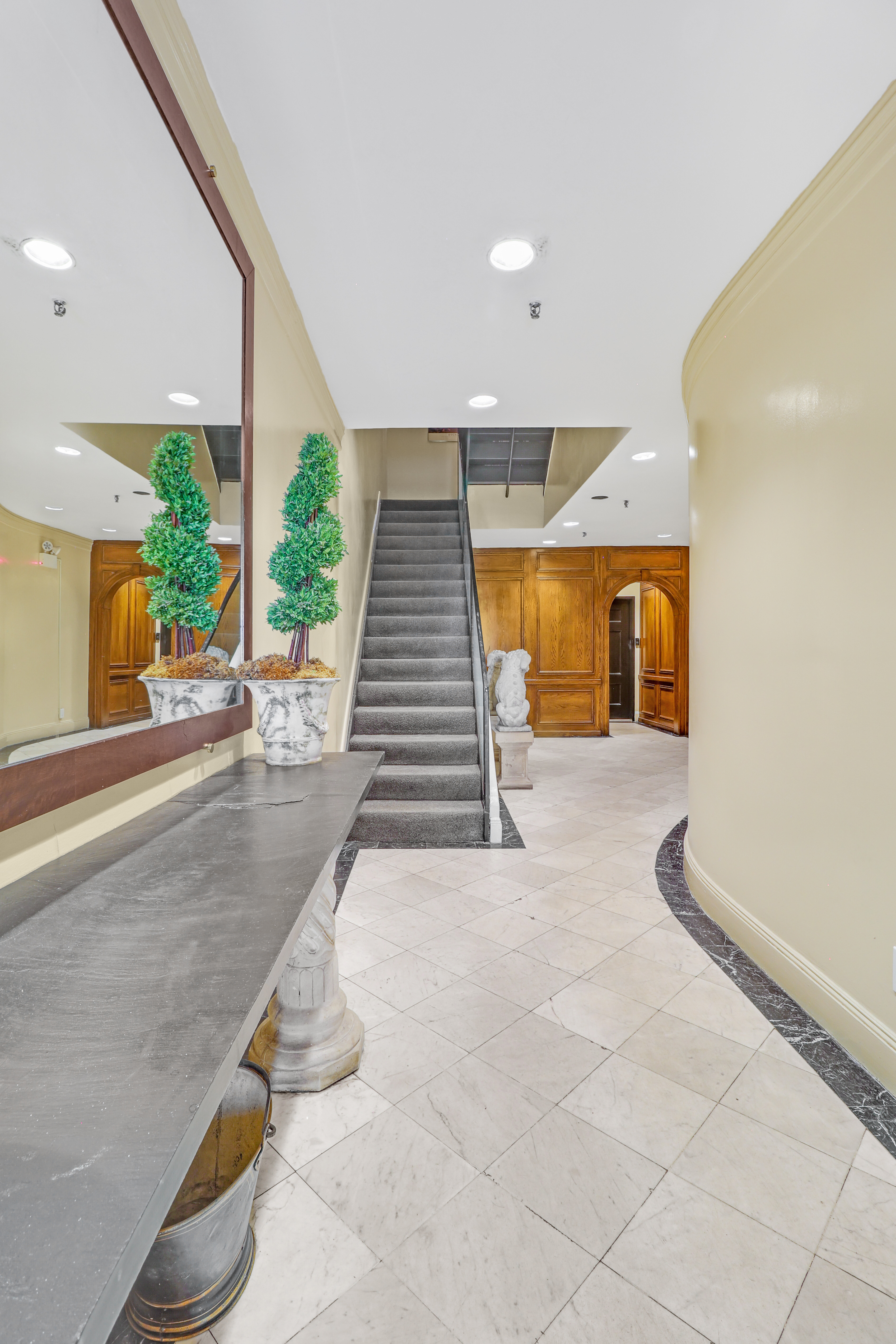 14 East 68th Street, Unit 3 Manhattan, NY 10065 - Photo 14 of 16 a view of entryway and hall with wooden floor