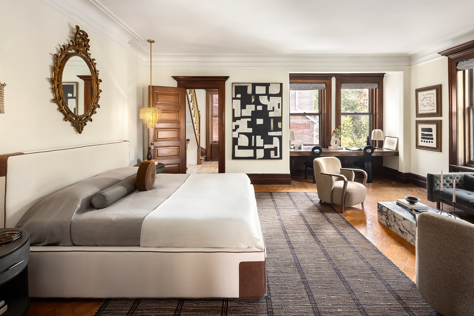 18 Prospect Park West Brooklyn, NY 11215 - Photo 23 of 40 a spacious bedroom with a bed a couch and a large window