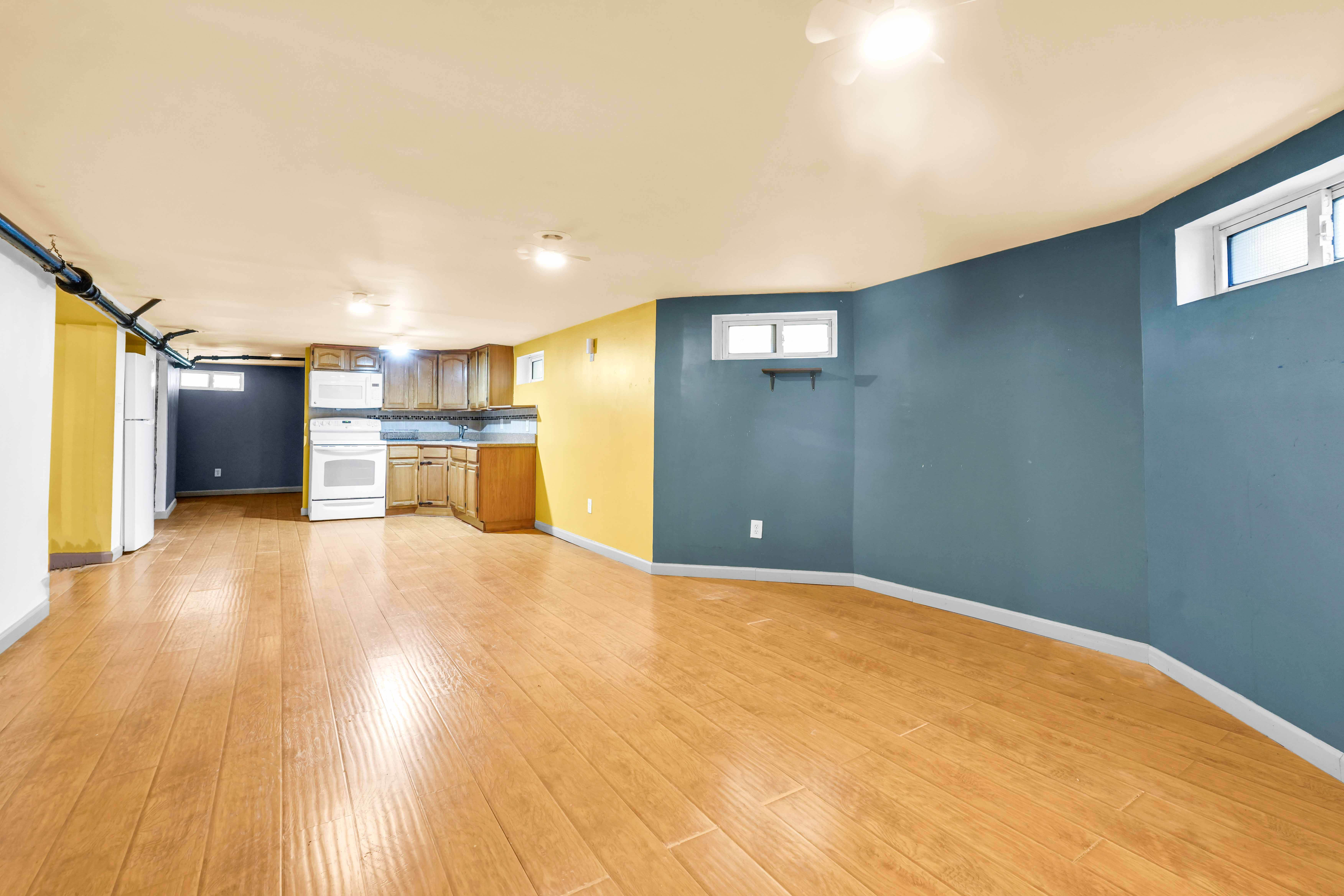 642 East 26th Street Brooklyn, NY 11210 - Photo 27 of 32 a view of a kitchen with a dishwasher and a refrigerator