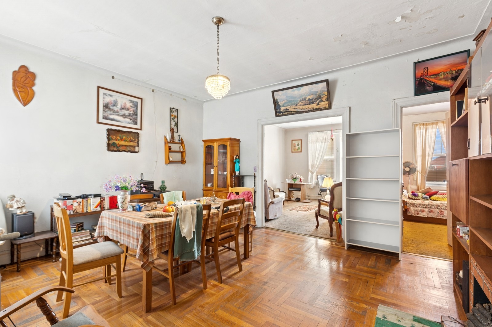 5606 Snyder Avenue Brooklyn, NY 11203 - Photo 2 of 12 a view of a dining room with furniture and wooden floor