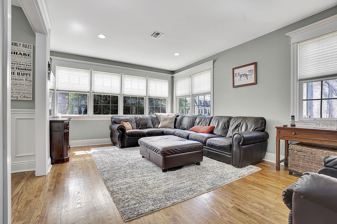 266 Feronia Way Rutherford, NJ 07070 - Photo 7 of 41 a living room with furniture large window and wooden floor