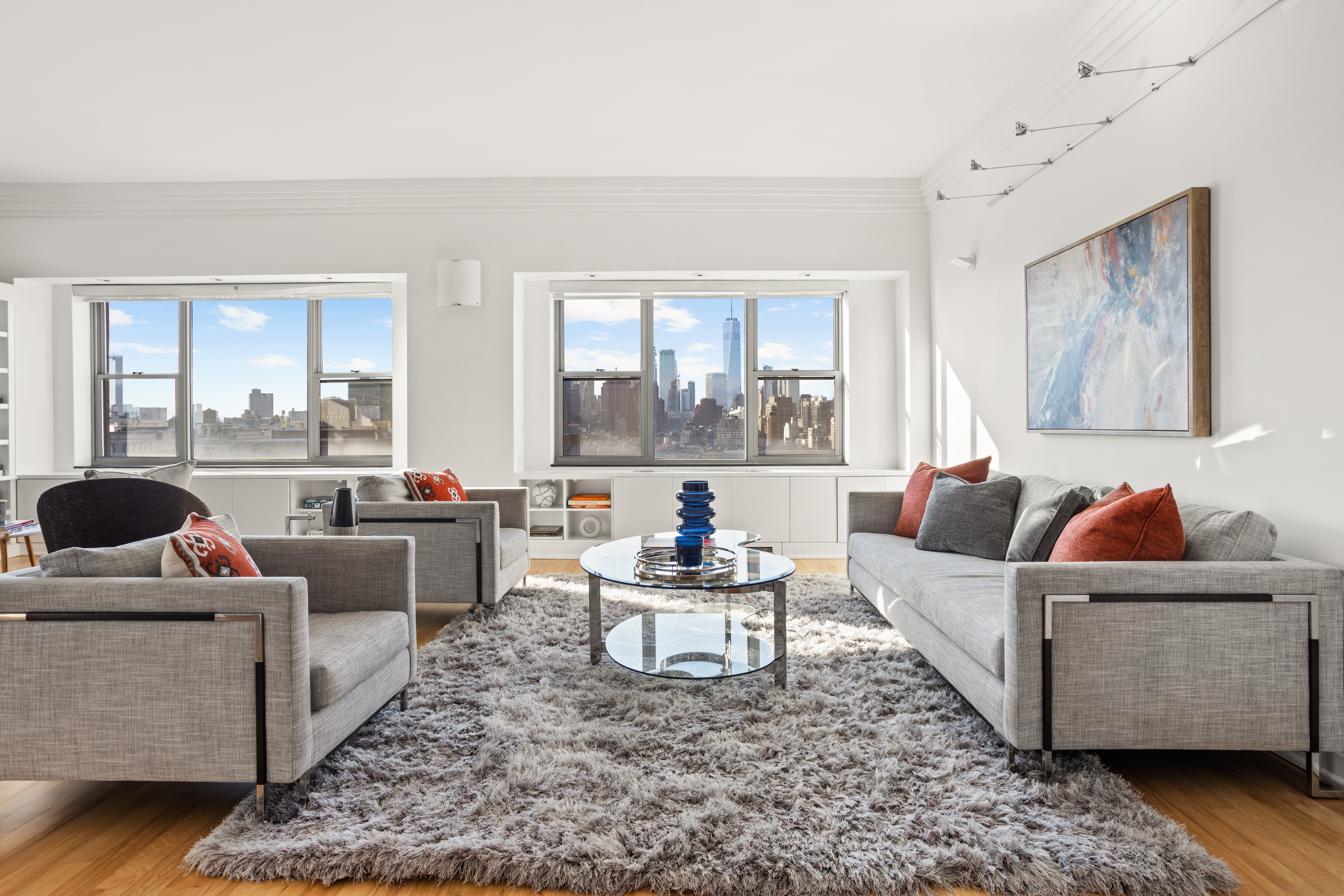 2 5th Avenue, Unit PHDF Manhattan, NY 10011 - Photo 3 of 24 a living room with furniture and a large window