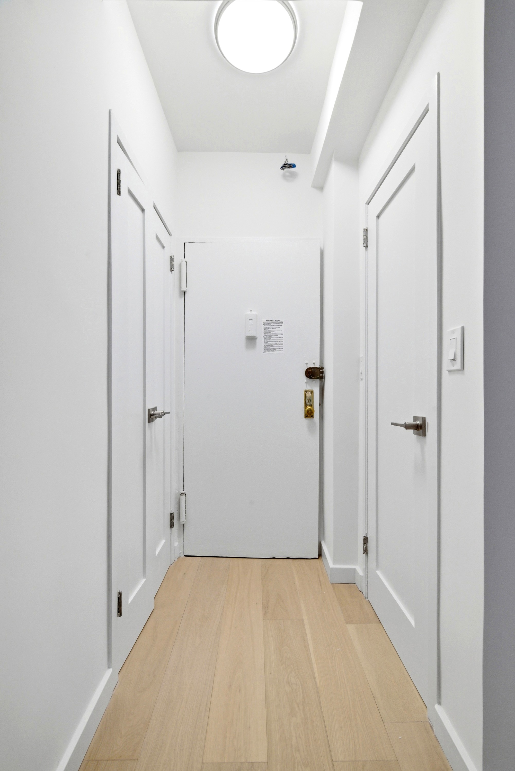 240 East 46th Street, Unit 8J Manhattan, NY 10017 - Photo 9 of 11 a view of an empty room
