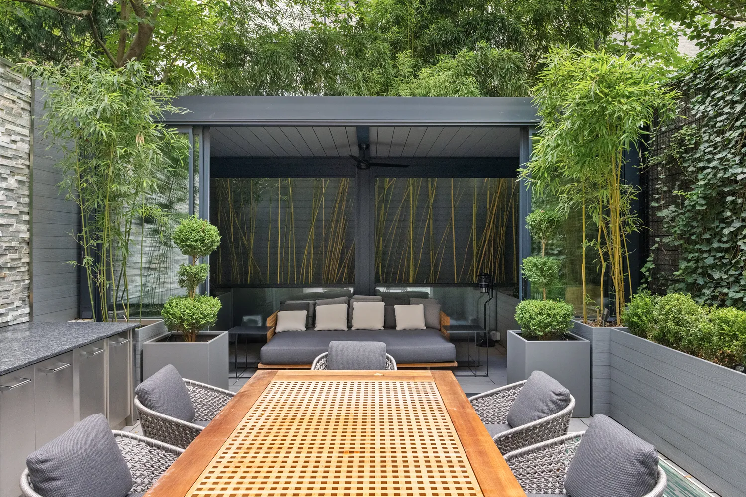 a view of a patio with a table and chairs